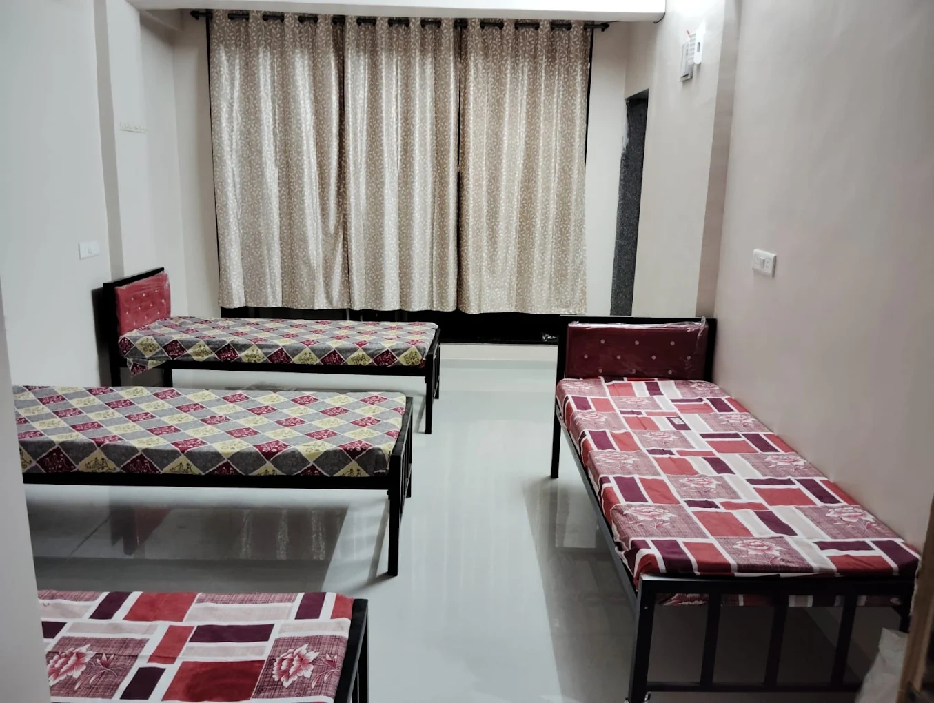 Comfortable bedroom at Atul PG Ghansoli - affordable PG in Navi Mumbai for boys and girls
